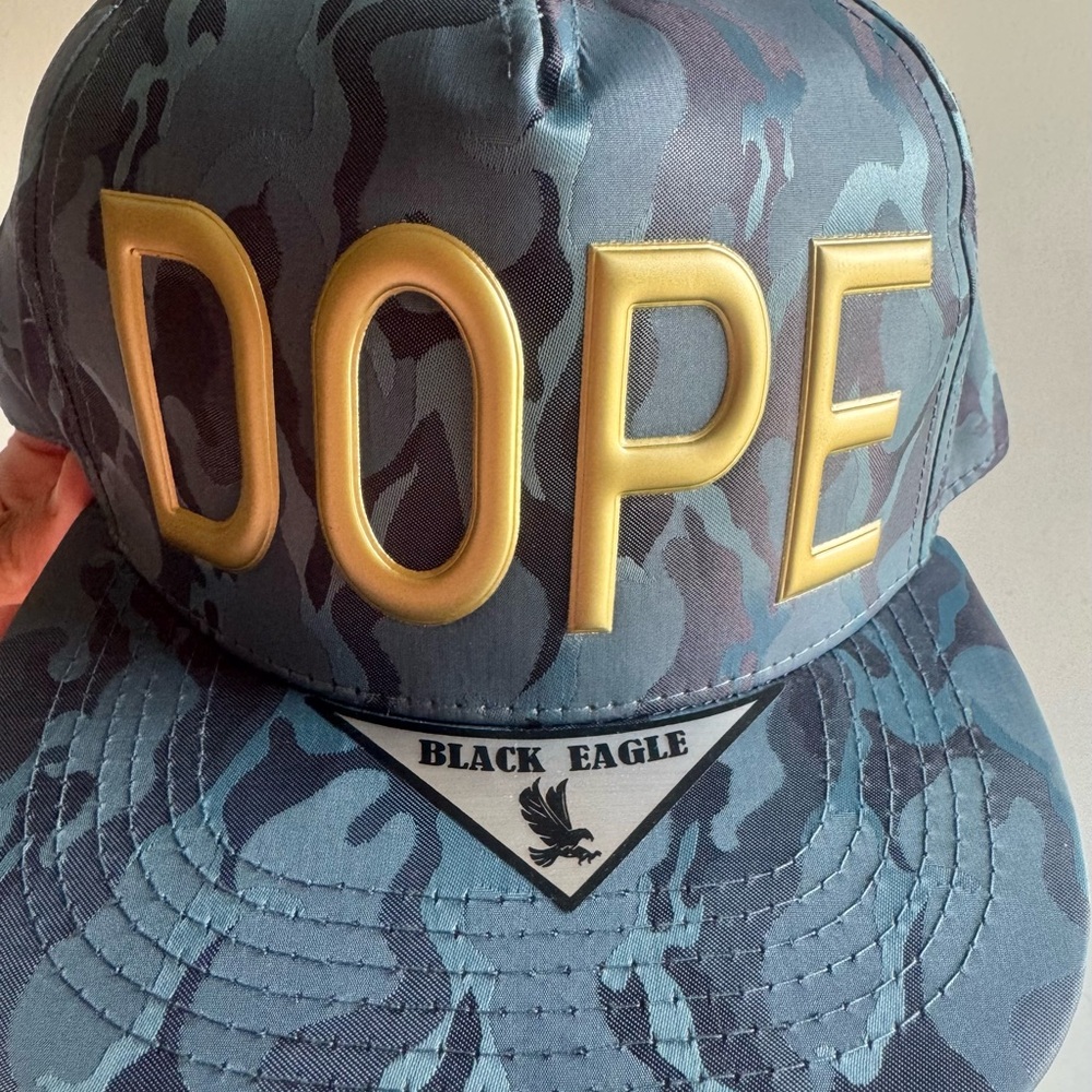 DOPE SnapBack in a blue camo with yellow letters - NEW & never worn